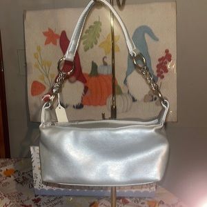 Excellent condition small unbranded silver hand bag w/silver hardware!